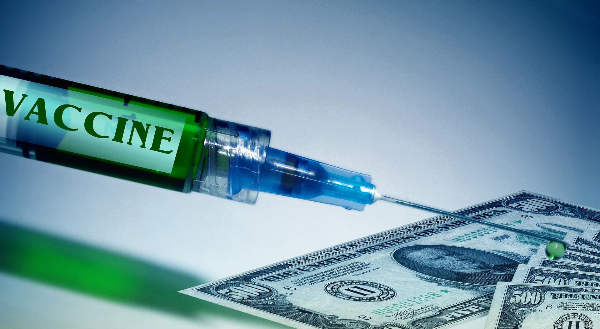 syringe vaccine dollar bills