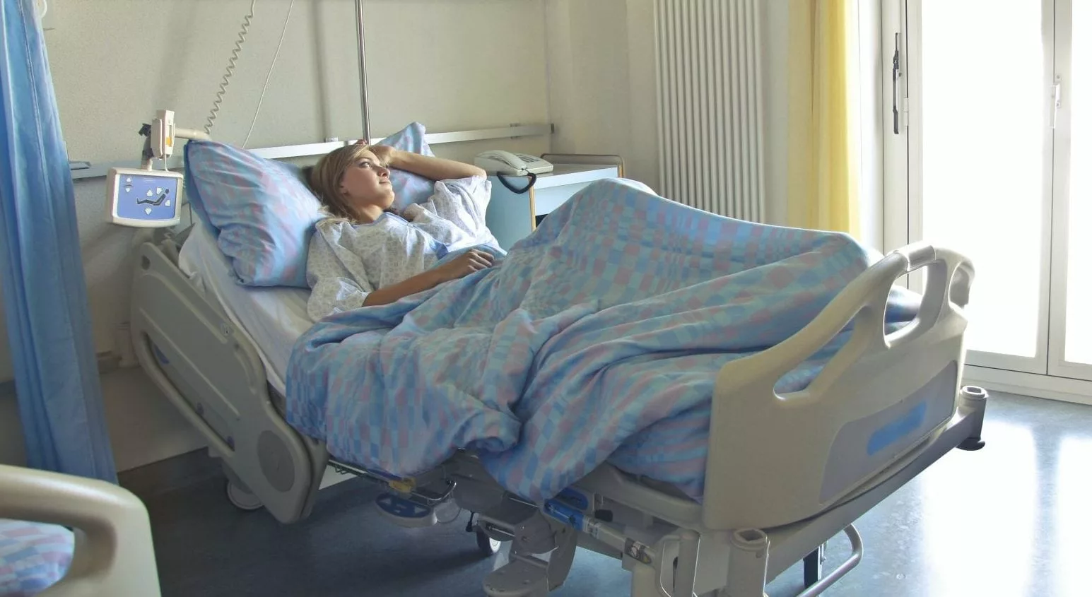woman patient hospital bed