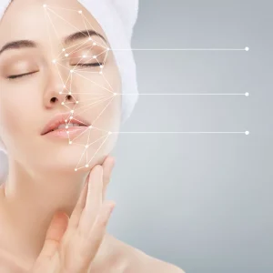 beautiful woman applying cosmetic cream